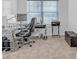 Home office with built-in bench seating and window at 180 Eryn Ter, Covington, GA 30014