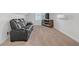 Home theater with reclining seats and a built-in electric fireplace at 180 Eryn Ter, Covington, GA 30014