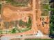 Birds eye view of a construction site and roads with heavy equipment at 48 Easton Park Blvd, Dallas, GA 30157