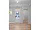Bright entryway featuring light wood floors and neutral paint at 48 Easton Park Blvd, Dallas, GA 30157