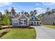 Charming single Gathering home with craftsman elevation, lush lawn, and long driveway at 48 Easton Park Blvd, Dallas, GA 30157