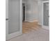 Living room area showcases the flooring and doorway to another room at 48 Easton Park Blvd, Dallas, GA 30157