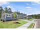 Street view of craftsman homes with well-manicured lawns and sidewalks at 48 Easton Park Blvd, Dallas, GA 30157