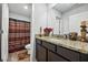 Bathroom boasts granite countertops and a shower/tub combo at 909 Teabiscuit Way, Mcdonough, GA 30253