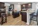 Modern kitchen with stainless steel appliances and an island at 909 Teabiscuit Way, Mcdonough, GA 30253
