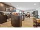 Modern kitchen features stainless steel appliances and an island at 909 Teabiscuit Way, Mcdonough, GA 30253