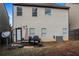 Small backyard with patio, grill, and privacy fence at 231 Magnaview Dr, Mcdonough, GA 30253