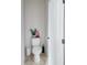Clean and simple half bathroom with a toilet and pedestal sink at 231 Magnaview Dr, Mcdonough, GA 30253