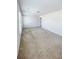 Spacious carpeted bedroom with neutral walls and large windows at 231 Magnaview Dr, Mcdonough, GA 30253