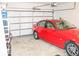 Attached garage with space for one car and overhead storage at 231 Magnaview Dr, Mcdonough, GA 30253