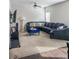 Large living room with sectional sofa and neutral carpeting, hardwood floors at 231 Magnaview Dr, Mcdonough, GA 30253