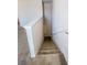 Staircase leading to upper level with neutral carpeting at 231 Magnaview Dr, Mcdonough, GA 30253