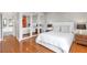Cozy bedroom with hardwood floors, large windows, and stylish decor at 2575 Peachtree Ne Rd # 11D, Atlanta, GA 30305