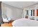 Cozy bedroom with hardwood floors, large windows, and stylish decor at 2575 Peachtree Ne Rd # 11D, Atlanta, GA 30305