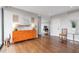 Spacious condo hallway with unique decor and hardwood floors at 2575 Peachtree Ne Rd # 11D, Atlanta, GA 30305