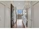 Bright kitchen features stainless steel appliances, custom white cabinets, and hardwood floors at 2575 Peachtree Ne Rd # 11D, Atlanta, GA 30305