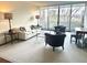 Bright living room with floor to ceiling windows and elegant decor at 2575 Peachtree Ne Rd # 11D, Atlanta, GA 30305