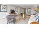 Comfortable living room with television, ample seating, and great lighting at 2575 Peachtree Ne Rd # 11D, Atlanta, GA 30305