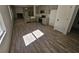 Modern kitchen with gray cabinets, stainless steel appliances, and vinyl flooring at 420 Florence Rd, Douglasville, GA 30134