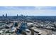 Aerial view of a modern highrise building in a city, showcasing the surrounding cityscape and landscape at 788 W Marietta Nw St # 1513, Atlanta, GA 30318