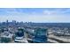 Aerial view of a modern highrise building in a city, showcasing the surrounding cityscape and landscape at 788 W Marietta Nw St # 1513, Atlanta, GA 30318