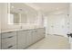 Modern bathroom with double vanity, large mirror, and walk-in shower at 788 W Marietta Nw St # 1513, Atlanta, GA 30318