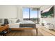Bedroom with hardwood floors and stunning mountain views at 788 W Marietta Nw St # 1513, Atlanta, GA 30318