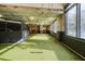 Indoor dog run with artificial turf and city mural at 788 W Marietta Nw St # 1513, Atlanta, GA 30318