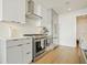 Modern kitchen with stainless steel appliances and white subway tile at 788 W Marietta Nw St # 1513, Atlanta, GA 30318