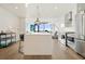 Modern kitchen with white cabinets and island at 788 W Marietta Nw St # 1513, Atlanta, GA 30318