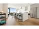 Modern kitchen with stainless steel appliances and an island at 788 W Marietta Nw St # 1513, Atlanta, GA 30318
