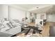 Open concept living room and kitchen with hardwood floors and island at 788 W Marietta Nw St # 1513, Atlanta, GA 30318
