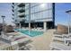 Resort-style rooftop pool with ample lounge chairs at 788 W Marietta Nw St # 1513, Atlanta, GA 30318