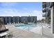Relaxing rooftop pool with lounge chairs and city views at 788 W Marietta Nw St # 1513, Atlanta, GA 30318