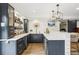 Modern bar with sleek cabinetry, quartz countertops, and wine storage at 3051 Oglethorpe Ne Way, Brookhaven, GA 30319