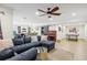 Finished basement with a large sectional sofa, bar area, and game table at 3051 Oglethorpe Ne Way, Brookhaven, GA 30319