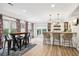 Basement bar area with a rustic table and barstools at 3051 Oglethorpe Ne Way, Brookhaven, GA 30319