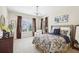 Comfortable bedroom with window seating and ensuite bathroom at 3051 Oglethorpe Ne Way, Brookhaven, GA 30319