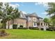 Two-story home with a side view showcasing brick and siding at 3051 Oglethorpe Ne Way, Brookhaven, GA 30319
