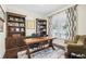 Functional home office with built-in shelving and a large desk at 3051 Oglethorpe Ne Way, Brookhaven, GA 30319
