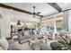 Open-concept living room with hardwood floors and access to the kitchen at 3051 Oglethorpe Ne Way, Brookhaven, GA 30319