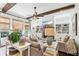 Spacious living room with exposed beams, built-in shelving, and a fireplace at 3051 Oglethorpe Ne Way, Brookhaven, GA 30319