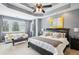 Main bedroom with sitting area and plenty of natural light at 3051 Oglethorpe Ne Way, Brookhaven, GA 30319