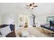 Spacious office or bonus room with a desk, sofa, and built-in shelving at 3051 Oglethorpe Ne Way, Brookhaven, GA 30319