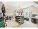 Large walk-in closet with island and ample storage at 3051 Oglethorpe Ne Way, Brookhaven, GA 30319