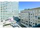 Private balcony overlooking city parking and buildings at 3040 Peachtree Rd # 802, Atlanta, GA 30305
