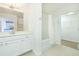Clean bathroom with white vanity and bathtub at 3040 Peachtree Rd # 802, Atlanta, GA 30305