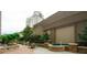 Water feature and patio furniture in a well-maintained courtyard at 3040 Peachtree Rd # 802, Atlanta, GA 30305