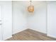 Simple dining area with wood-look floors and a stylish light fixture at 3040 Peachtree Road # 802, Atlanta, GA 30305