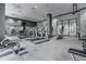 Well-equipped fitness center with cardio and weight machines at 3040 Peachtree Rd # 802, Atlanta, GA 30305